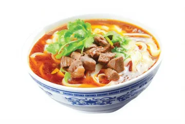 Pasta slices with soup and beef