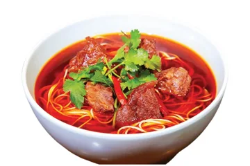 Pasta with soup, meat and chili