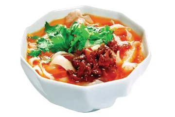Pasta slices with red sauce, meat and vegetables